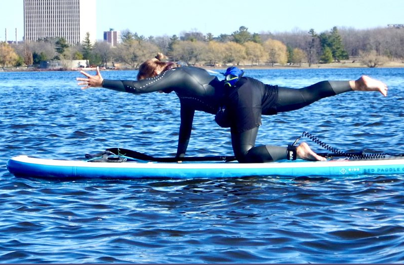 Basia on Ottawa River, yoga paddleboarding