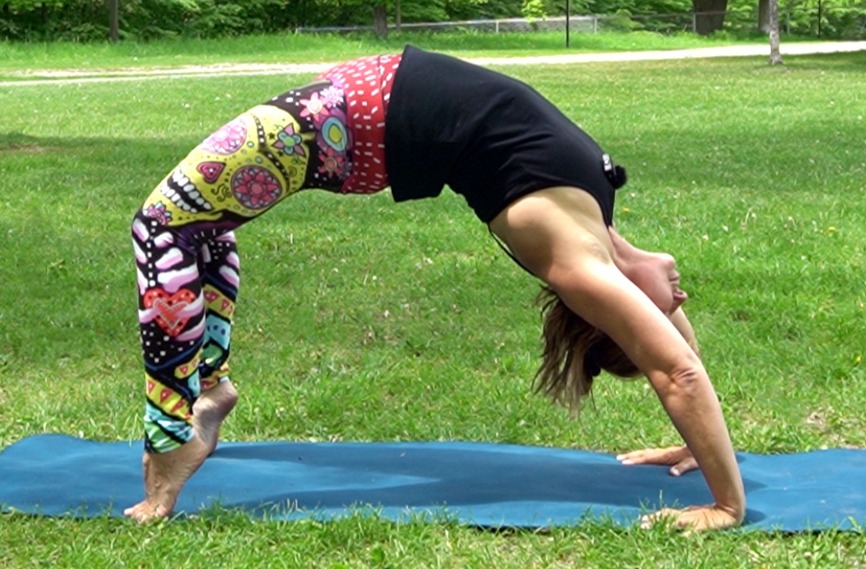 Basia yoga wheel in recorded class